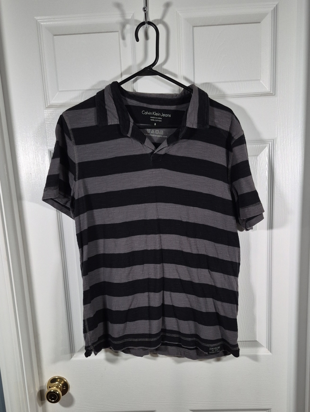 Calvin Klein Jeans Men’s Black and Gray Striped Polo